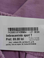 Pantaloni sport Ocean apart Femei - M